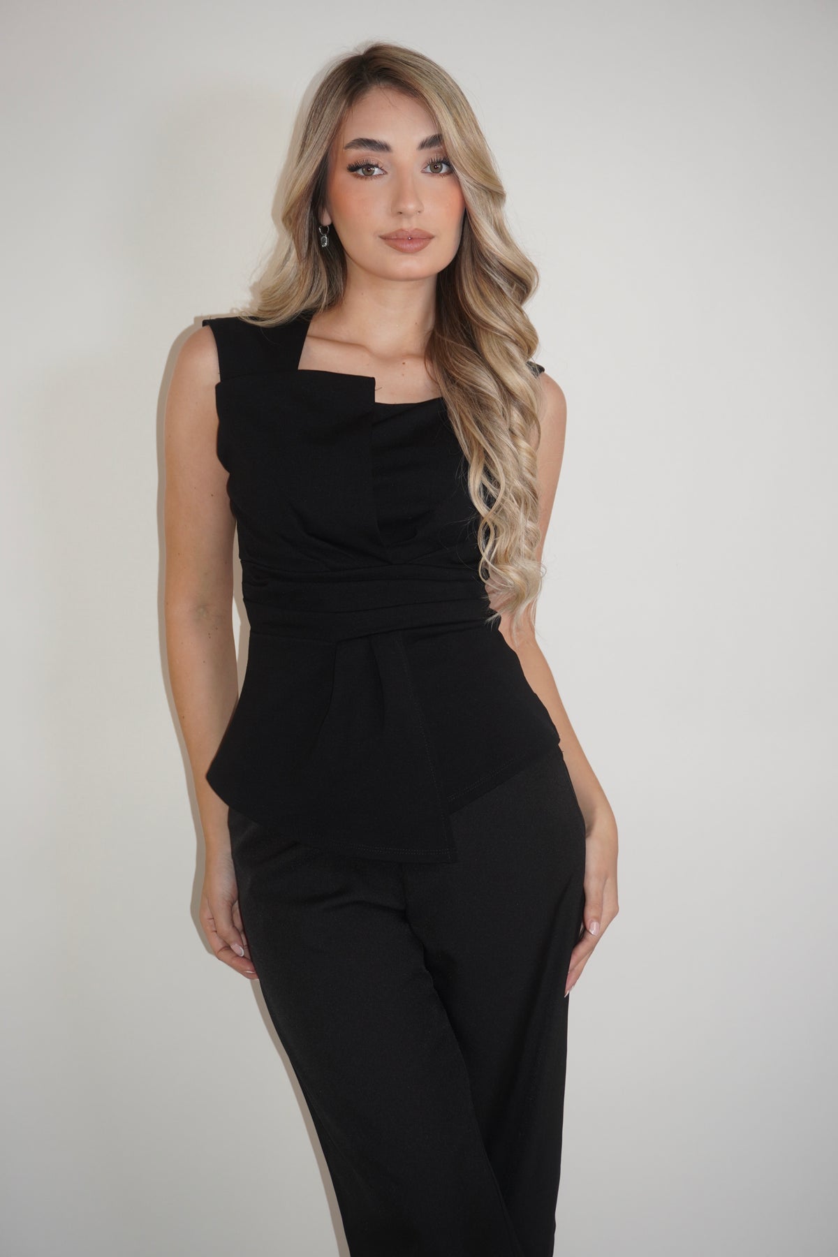 Sleeveless Folded Peplum Blouse