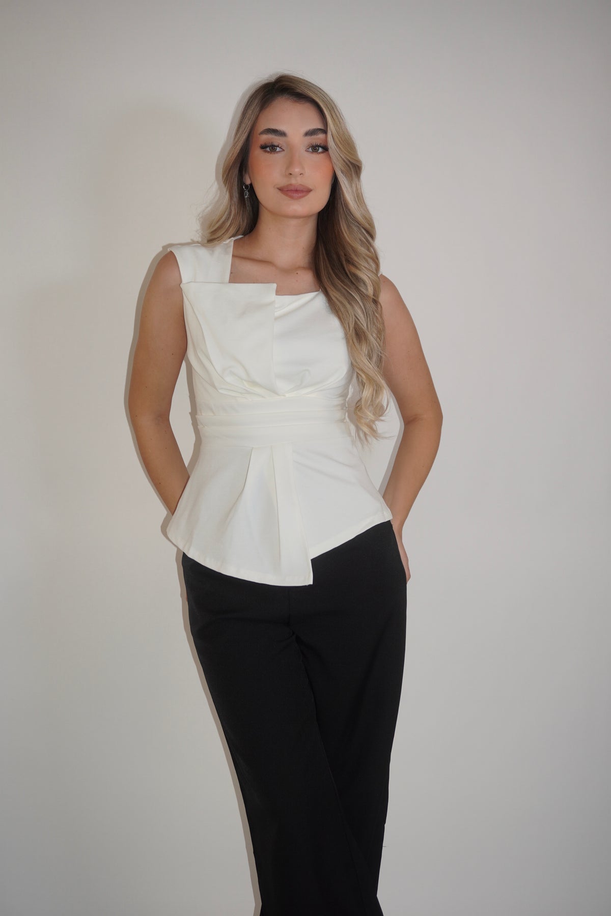 Sleeveless Folded Peplum Blouse