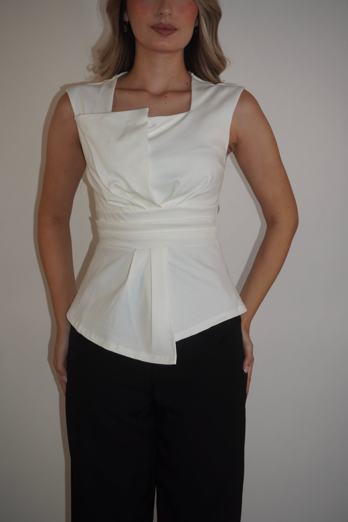 Sleeveless Folded Peplum Blouse