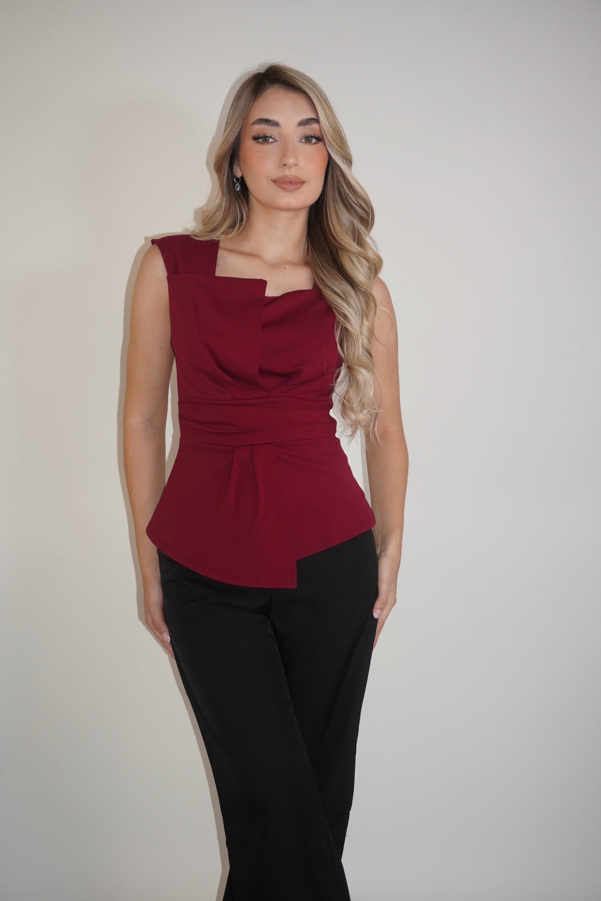 Sleeveless Folded Peplum Blouse